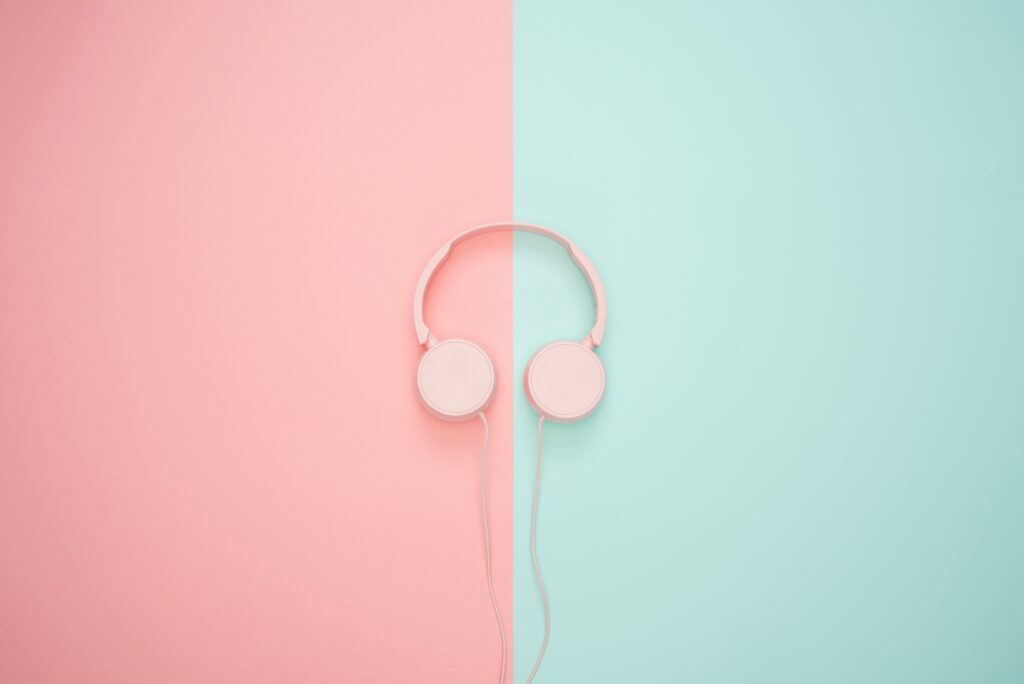 pink headphones with pink and blue background